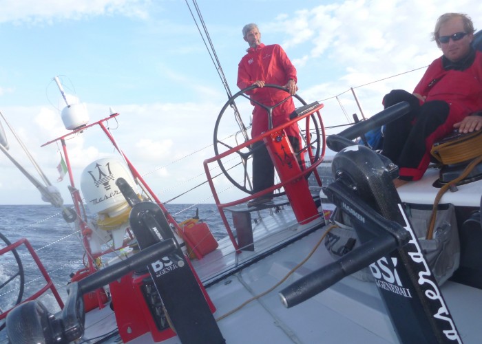 Maserati sailing under sunny skies